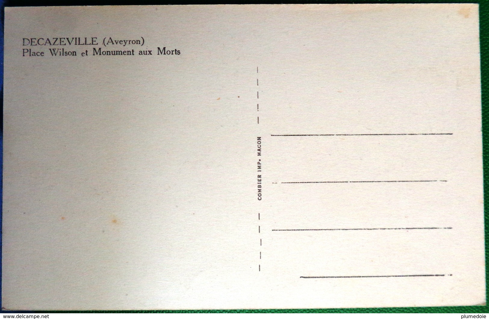 CPA 12 DECAZEVILLE  AVEYRON   Animée PLACE WILSON ET MONUMENT AUX MORTS  , Commerces EDITEUR CIM  COMBIER - Decazeville