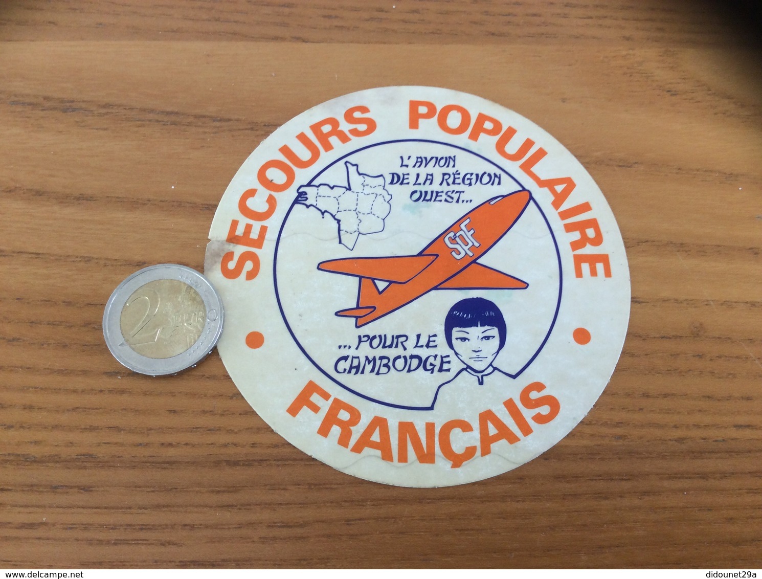 AUTOCOLLANT, Sticker «SPF SECOURS POPULAIRE FRANÇAIS - L’AVION DE LA RÉGION OUEST POUR LE CAMBODGE » - Stickers