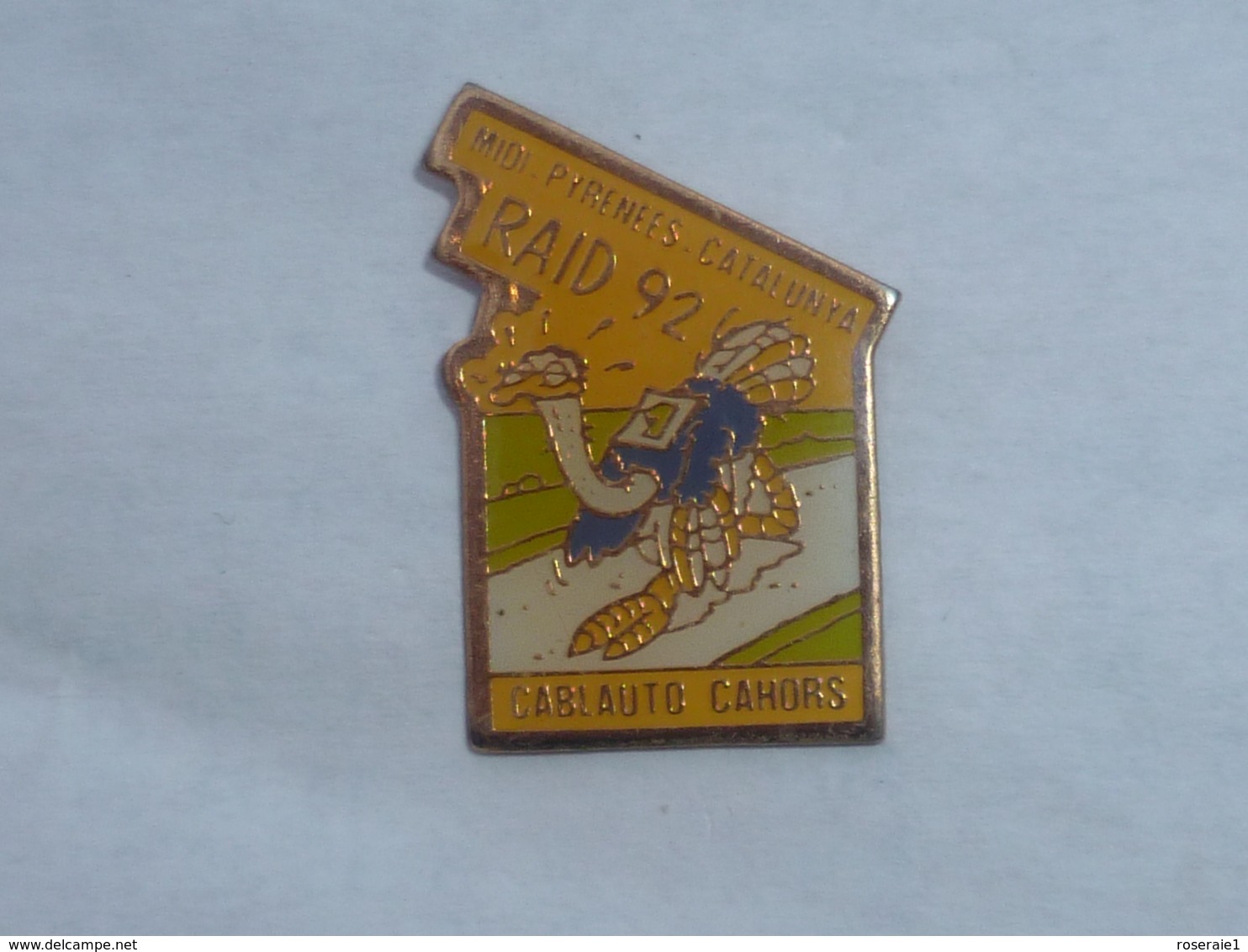 Pin's AUTRUCHE, RAID 92, MIDI PYRENEES-CATALUNYA, SPONSOR CABLAUTO CAHORS - Rallye