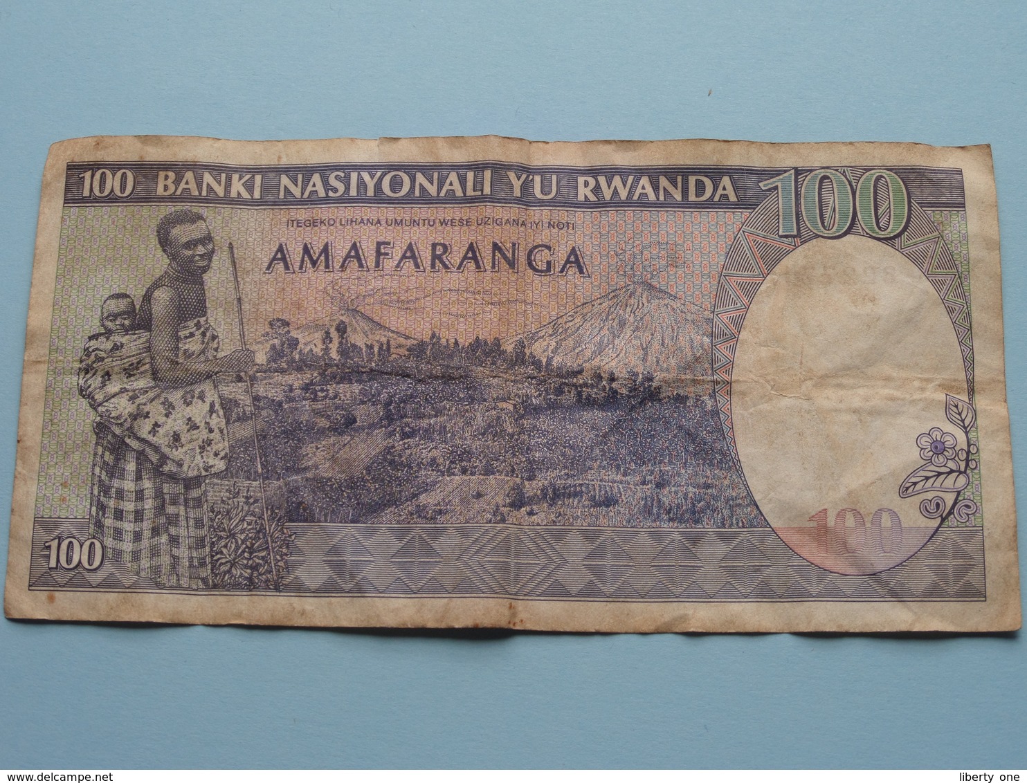 100 - Cent Francs AMARANGA BNKI NASIYONALI Yu RWANDA - L 8227715 > 24-04-1989 ( For Grade, Please See Photo ) ! - Rwanda