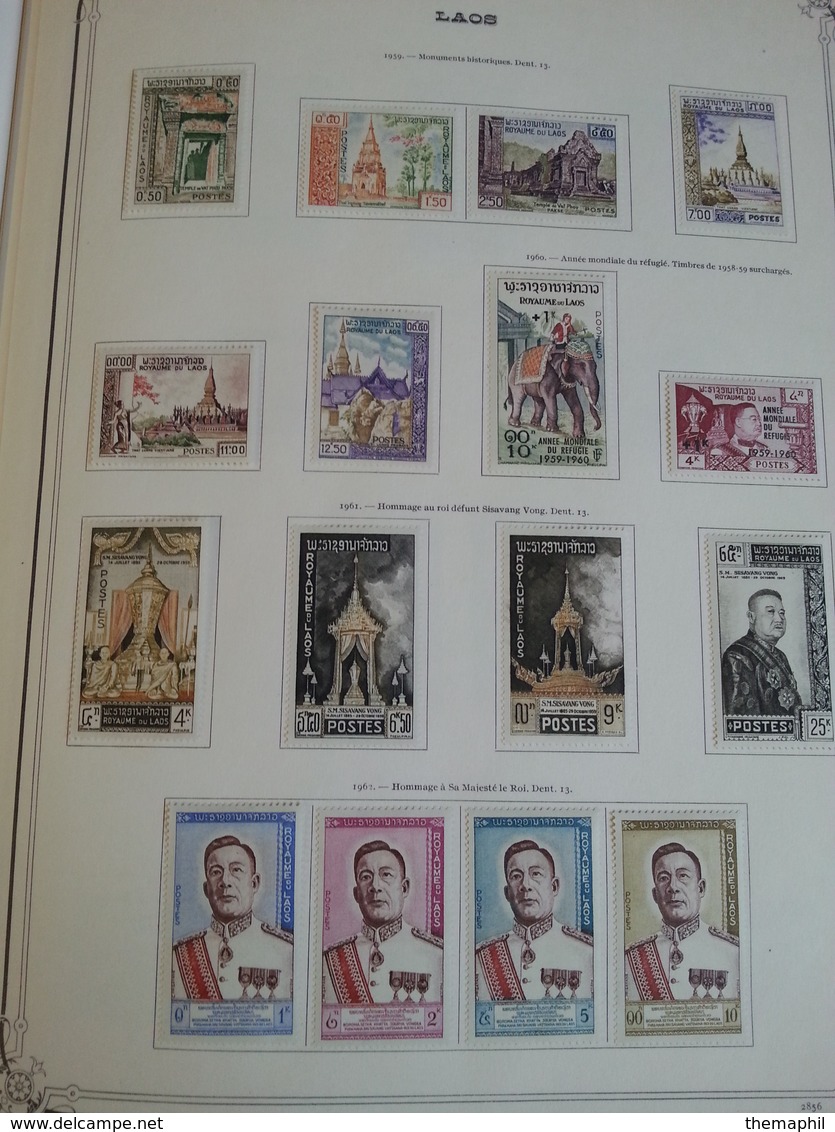 lot n° 605 LAOS collection sur pages d'albums neufs * timbres collés a 50 %