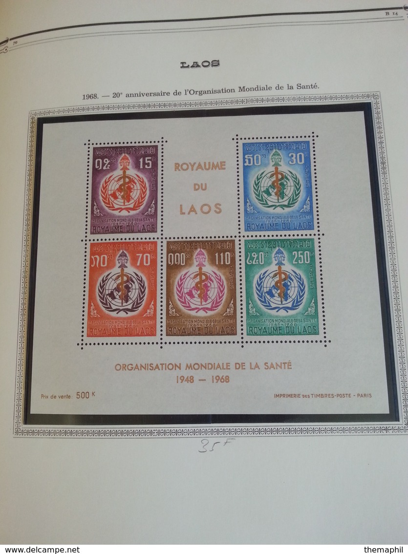 lot n° 605 LAOS collection sur pages d'albums neufs * timbres collés a 50 %