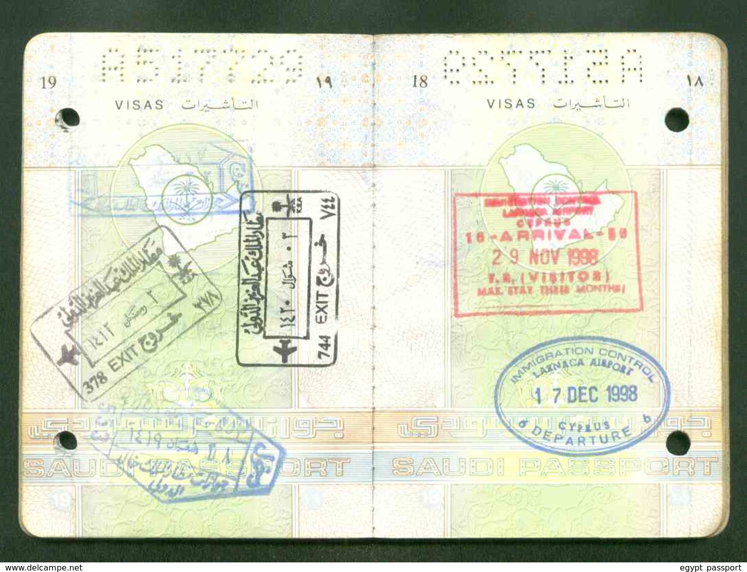 Saudi Arabia expired passport issue 1997 - Cancelled by Two punching holes through the passport - Condition as in Scan