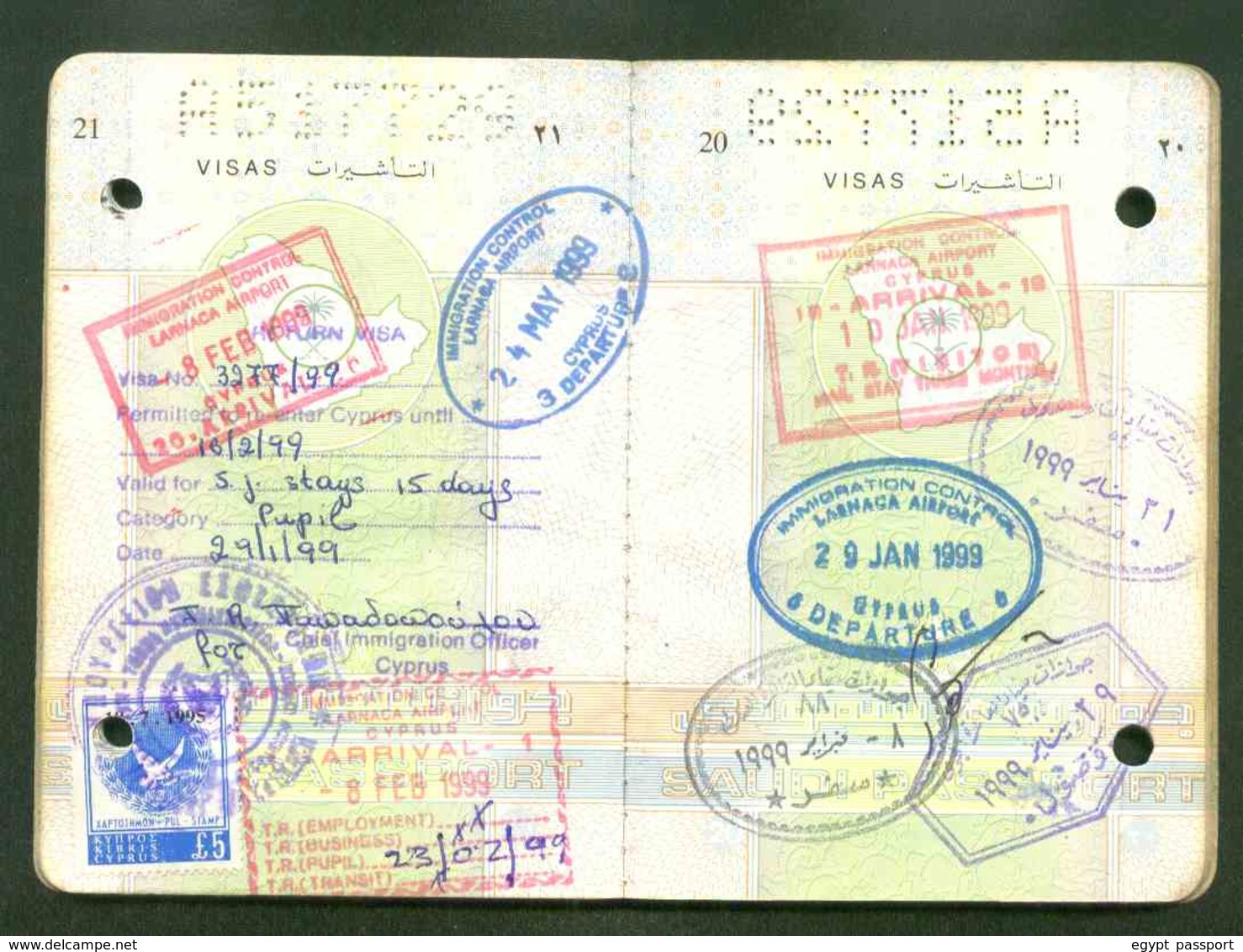 Saudi Arabia expired passport issue 1997 - Cancelled by Two punching holes through the passport - Condition as in Scan