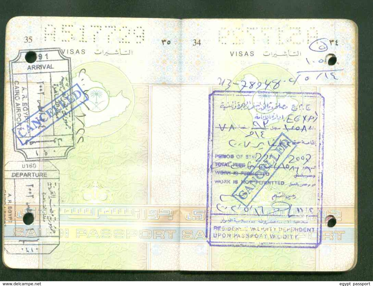 Saudi Arabia expired passport issue 1997 - Cancelled by Two punching holes through the passport - Condition as in Scan