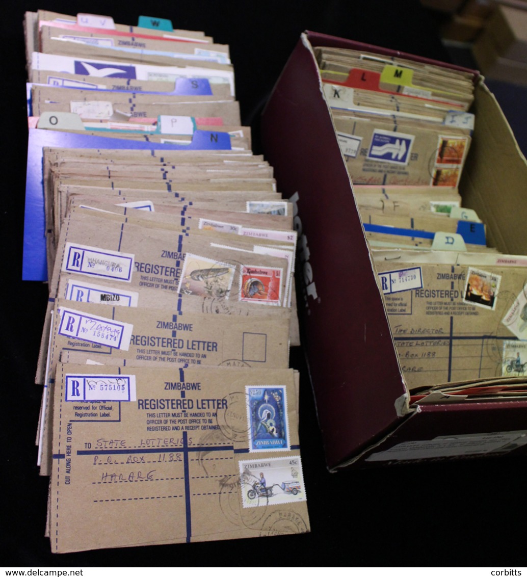 ZIMBABWE Collection Of Registered Envelopes From 1990's Arranged Alphabetically In A Box, All Different Postmarks Or Reg - Otros & Sin Clasificación