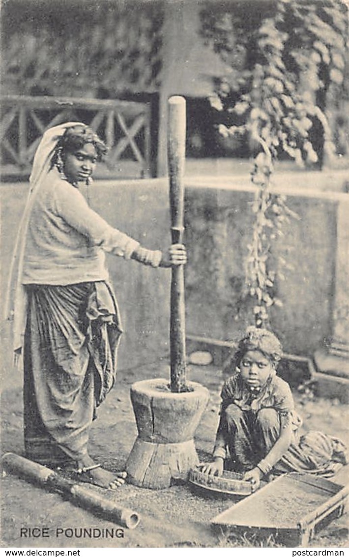 India - Woman And Child Pounding Rice. - India