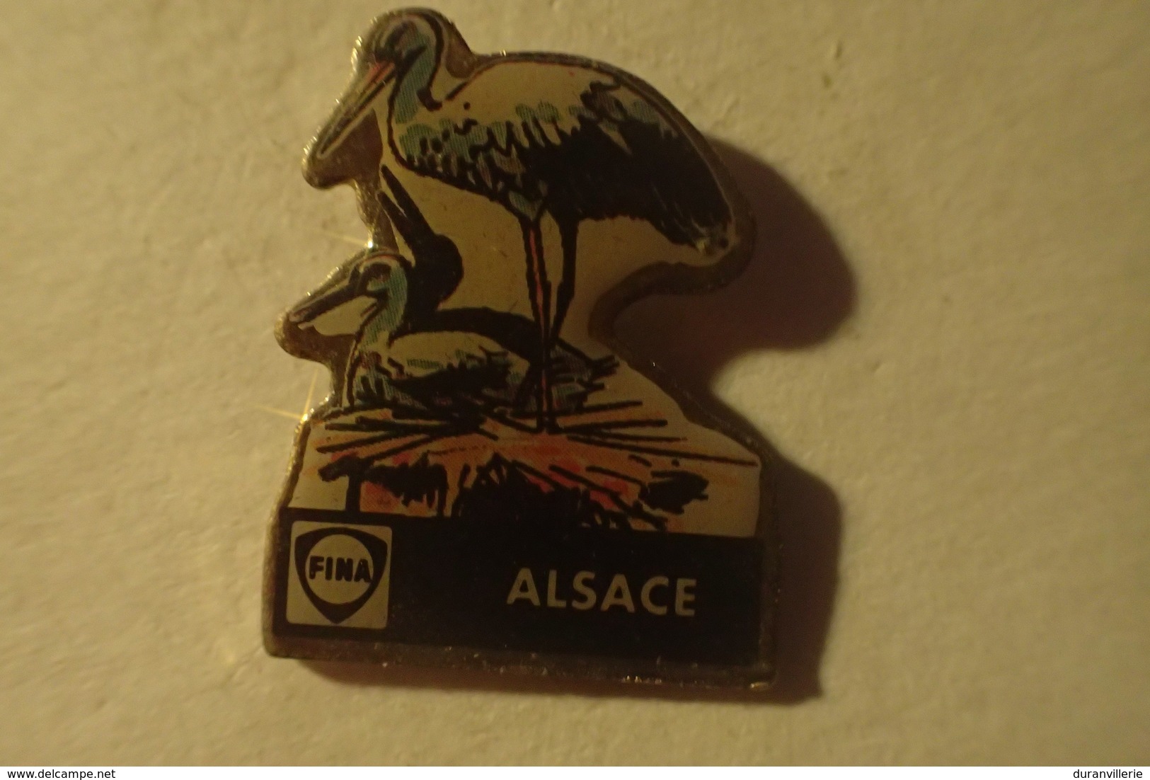 Pin's CIGOGNE D ALSACE, FINA - Carburants