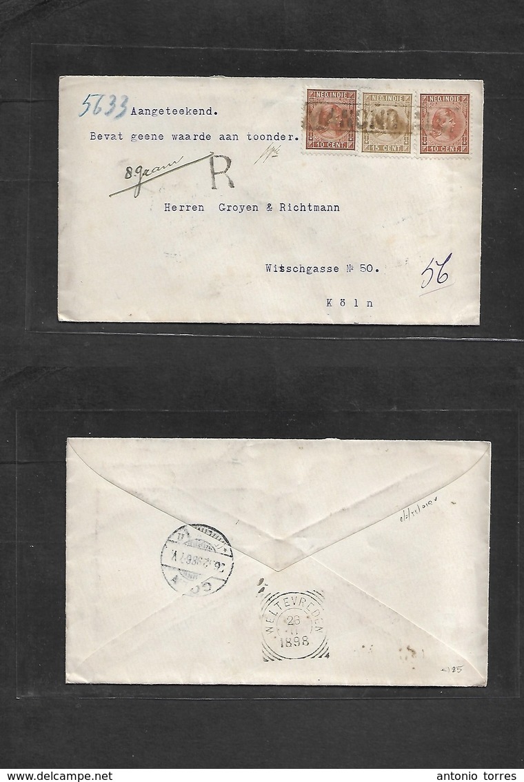 Dutch Indies. 1898 (26 Nov) Manonojail - Germany, Koln (26 Dec) Via Welteveeden. Registered Multifkd Envelope At 45c Rat - India Holandeses