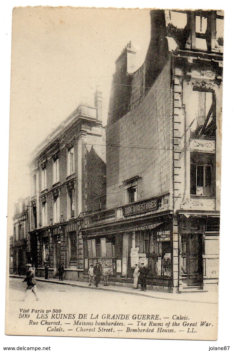 FORMAT CPA     62     CALAIS       RUINES GRANDE GUERRE       RUE CHAROST       MAGASINS RIDEAUX STORES - Calais