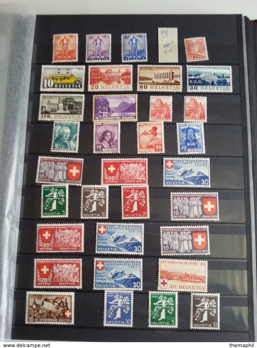 lot n° 768 un bon classeur de suisse  neufs ** ou obl.