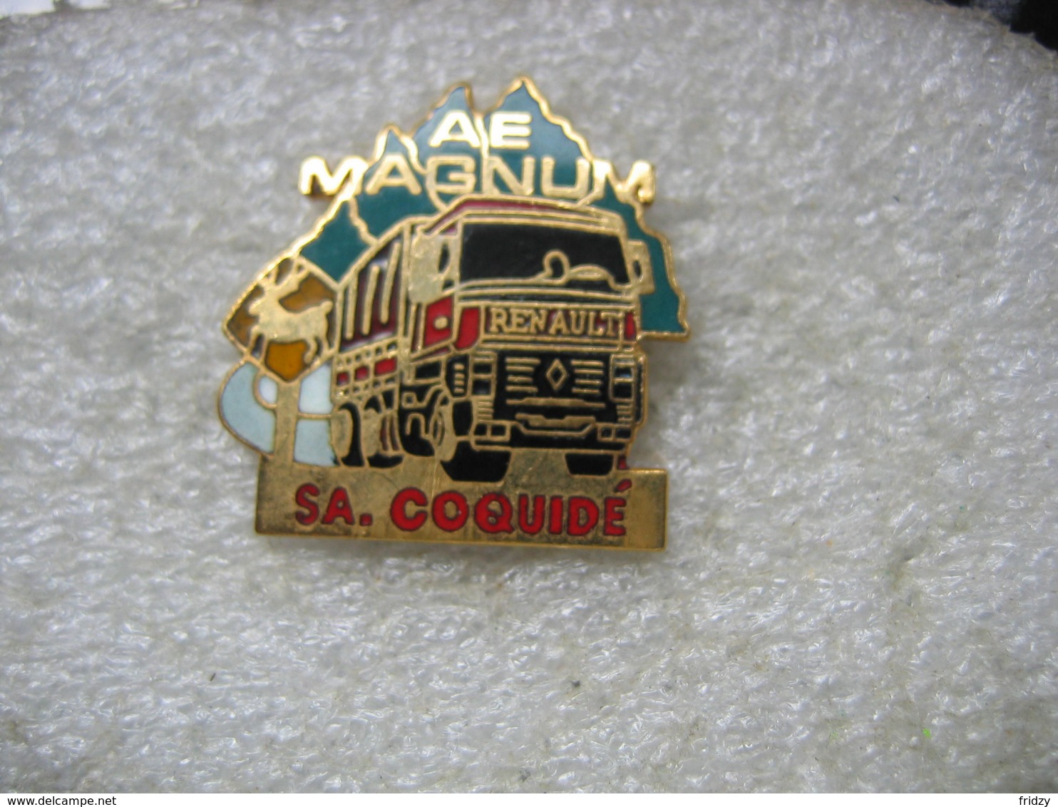 Pin's Ensemble Routier Renault AE Magnum Des Transports SA. COQUIDE - Transports