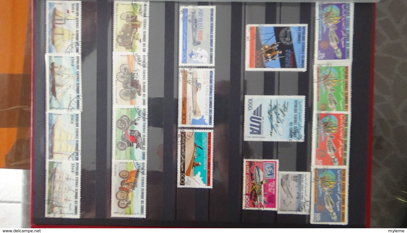 Petite collection des COMORES ** (1ère page uniquement) puis blocs et timbres oblitérés. A saisir !!!