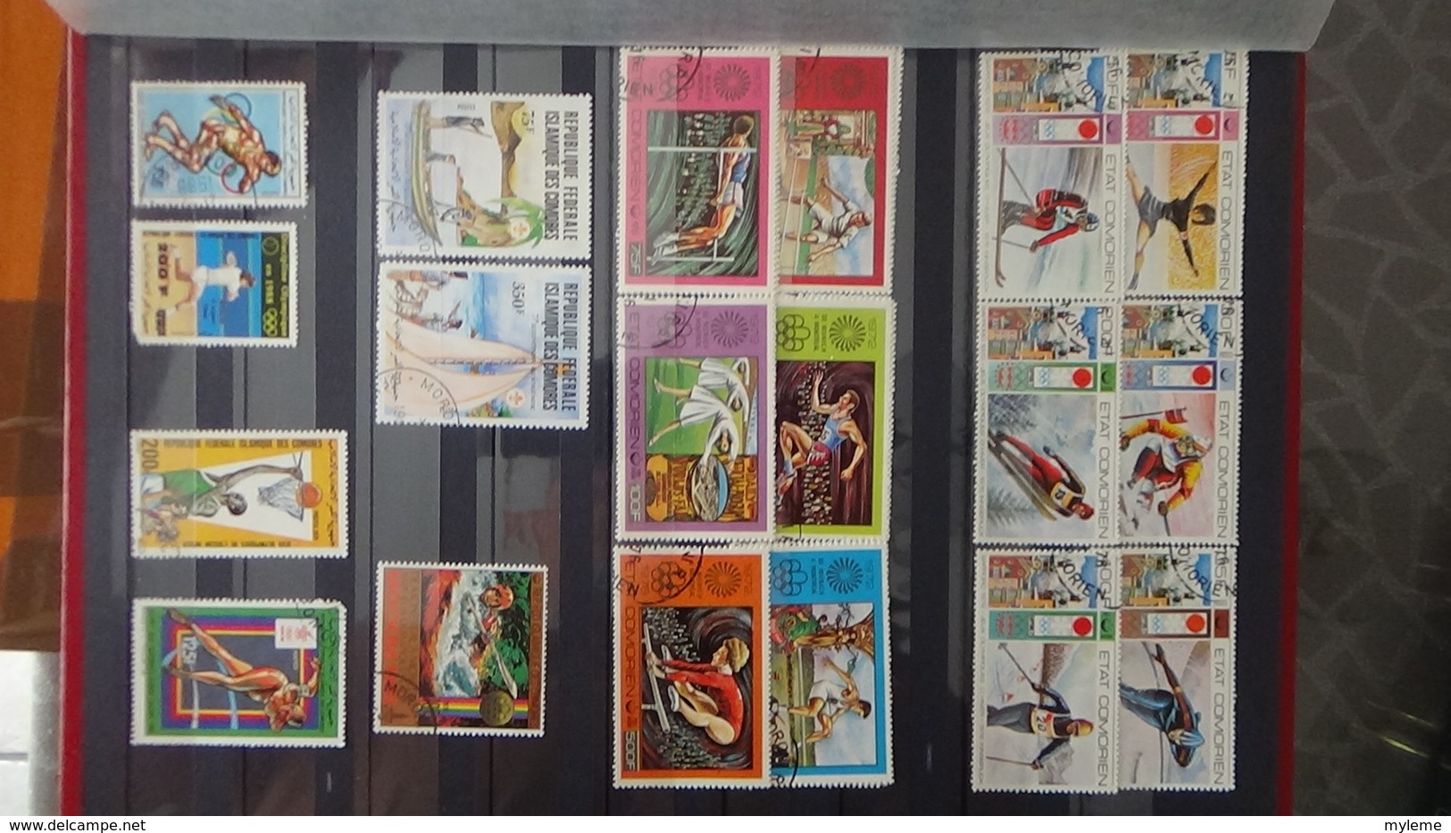 Petite collection des COMORES ** (1ère page uniquement) puis blocs et timbres oblitérés. A saisir !!!