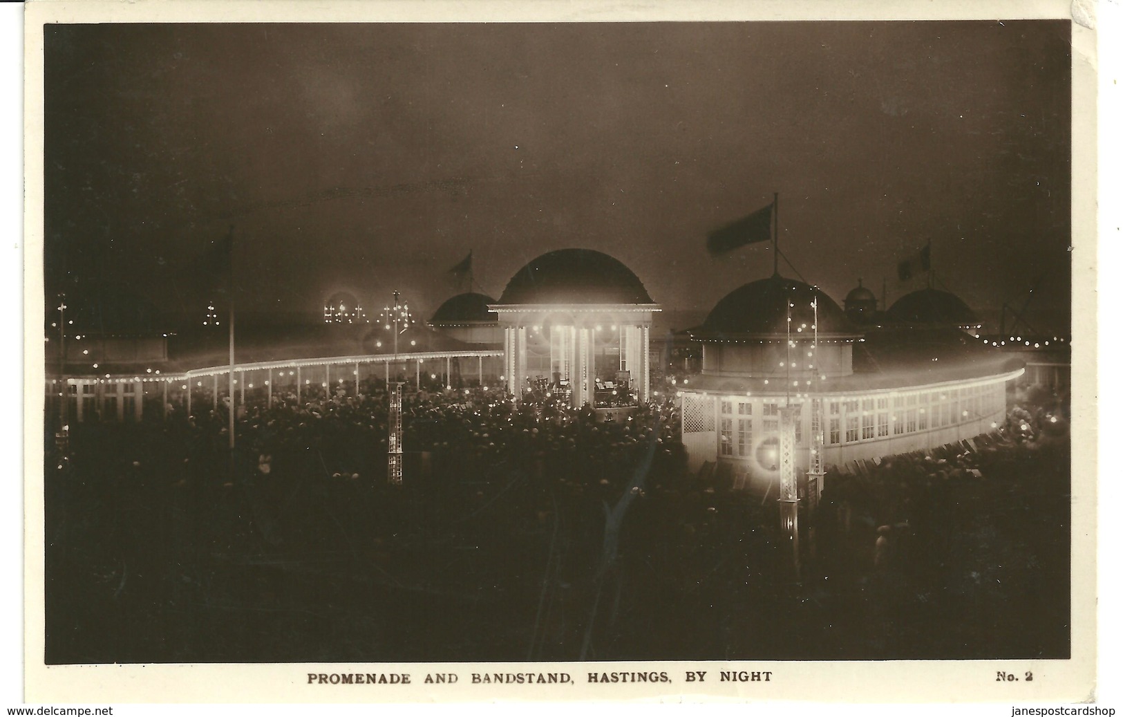 REAL PHOTOGRAPHIC POSTCARD PROMENADE AND BANDSTAND - HASTINGS BY NIGHT - Hastings