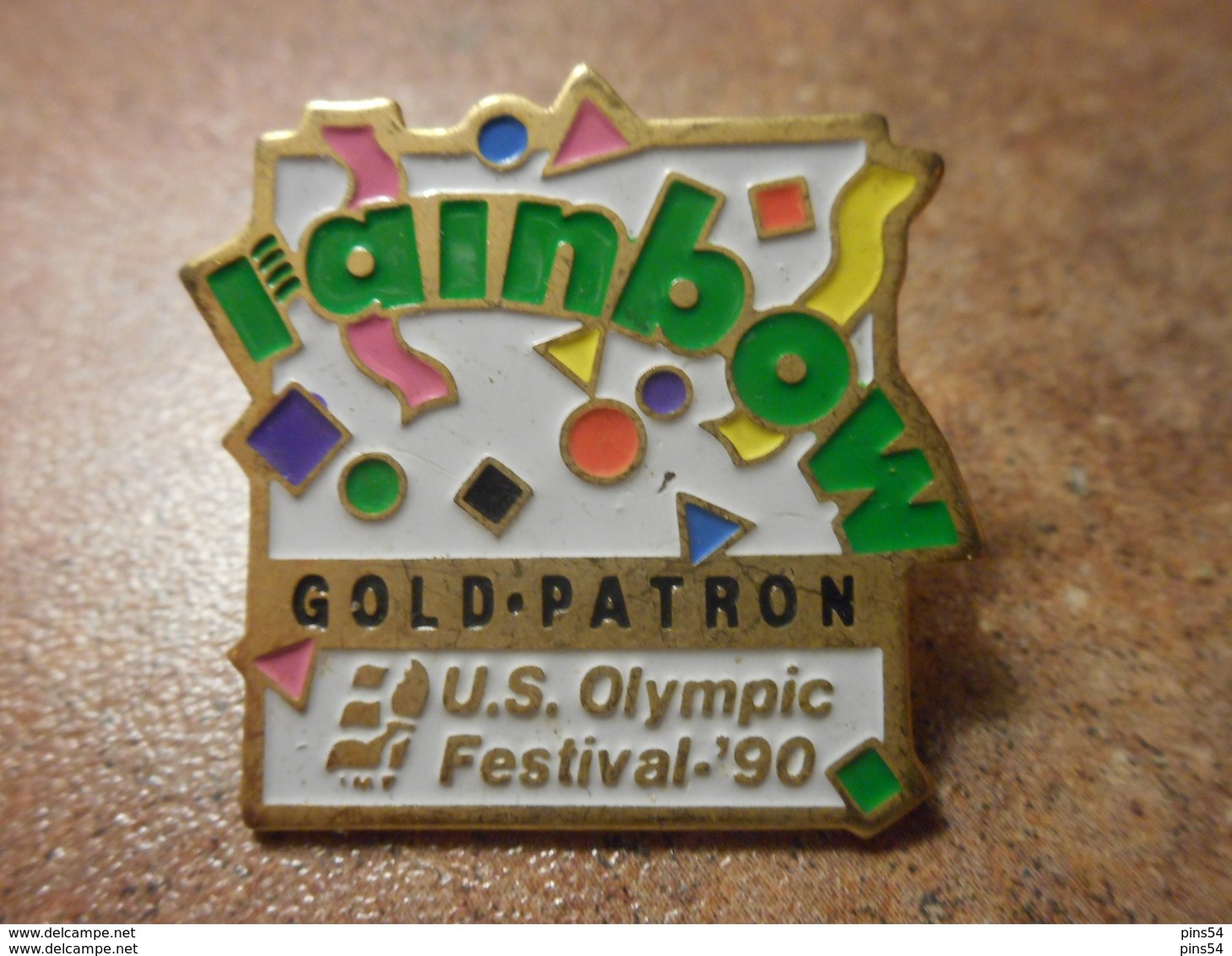 A024 -- Pin's Rainbow Gold Patron US Olympic Festival 90 - Jeux Olympiques