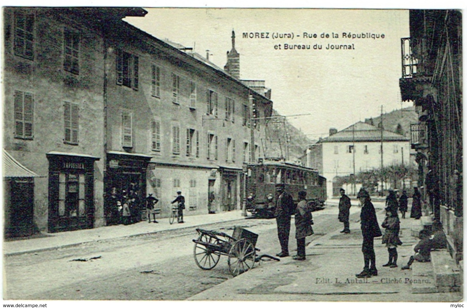 34. Morez (Jura). Rue De La République Et Bureau Du Journal. Tram. - Altri & Non Classificati