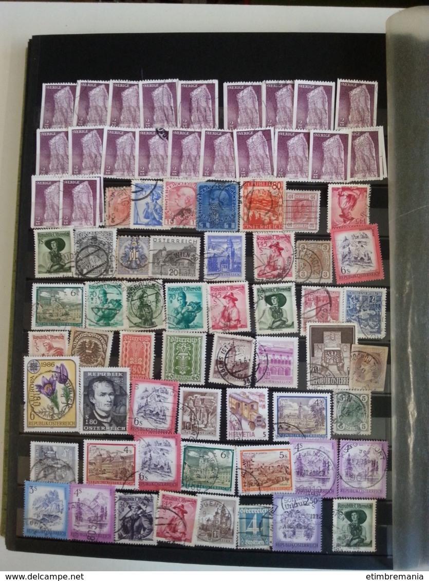 LOT N° e790  accumulation de timbres divers , dans un classeur