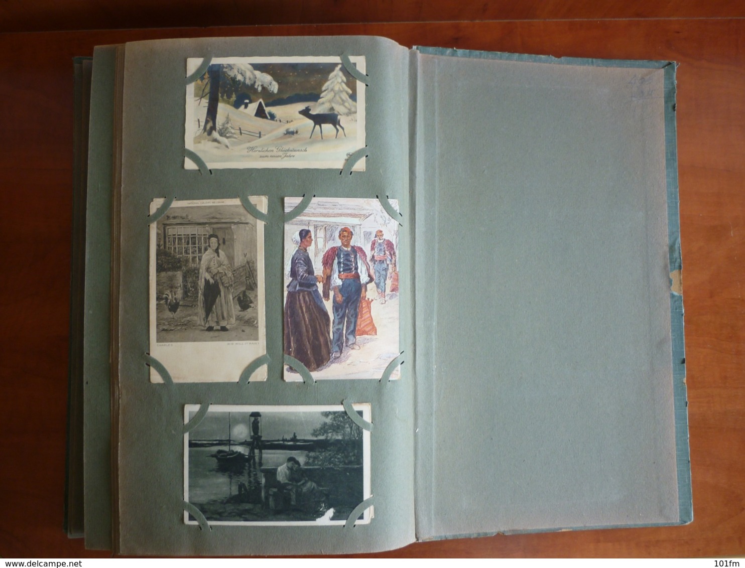 Old album ( Art deco style) with 496 old postcards