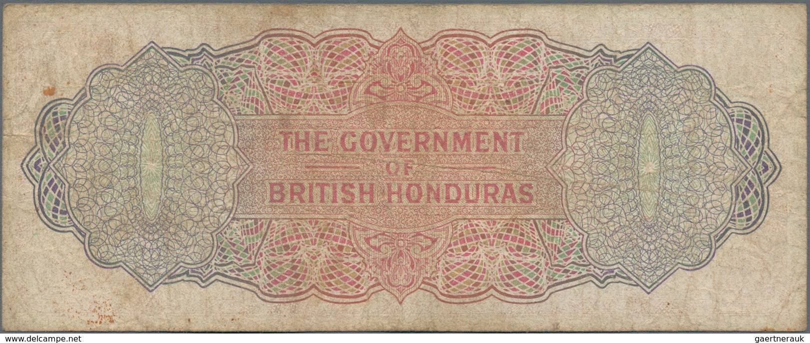 British Honduras: 5 Dollars 1973, P.30c, Lightly Stained Paper With Several Folds. Condition: F. Rar - Honduras