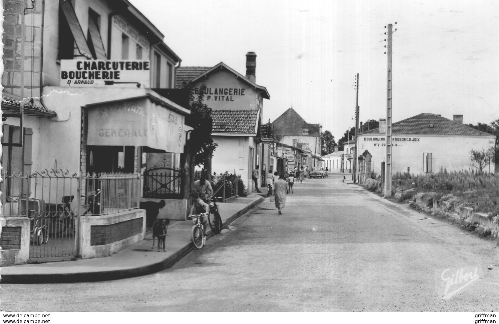 LE VERDON SUR MER UNE RUE DU CENTRE BOUCHERIE CHARCUTERIE CPSM 9X14 TBE - Autres & Non Classés