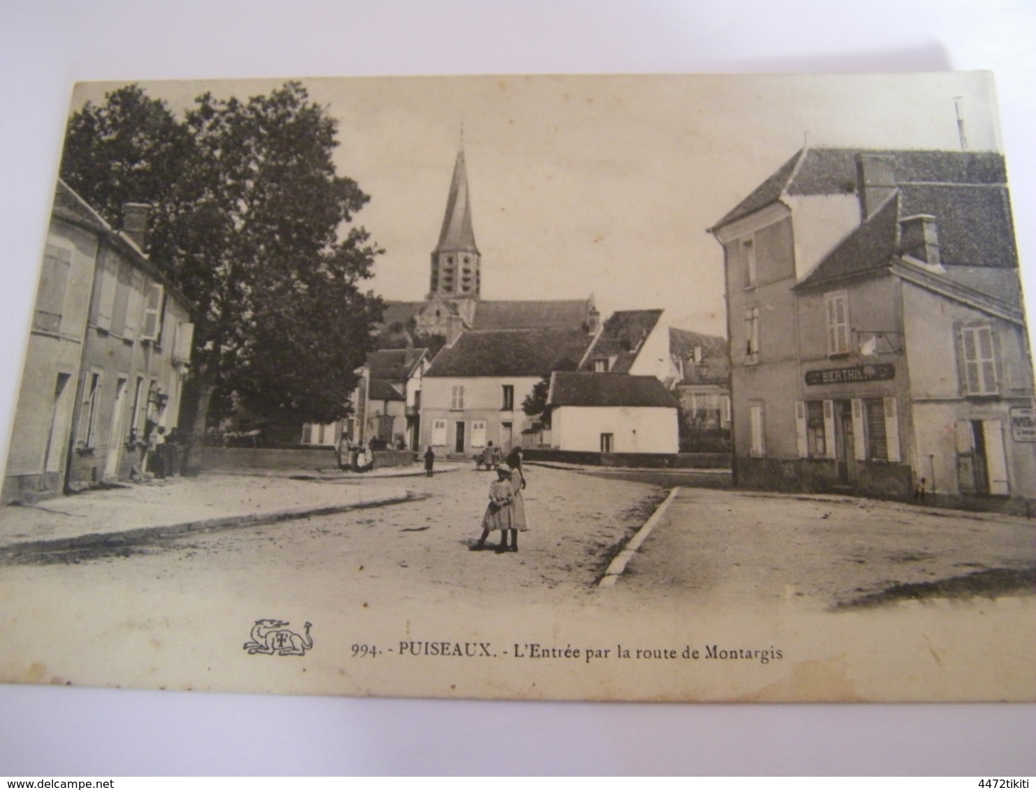 C.P.A.- Puiseaux (45) - L'Entrée Par La Route De Montargis - Maison Berthier - 1910 - SUP (CT 54) - Puiseaux