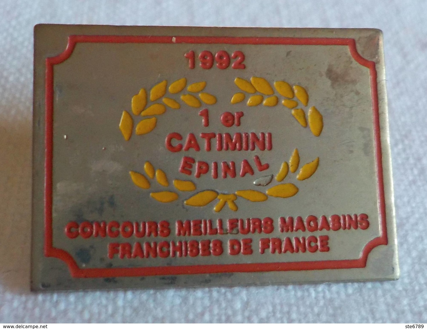 PINS PIN CATIMINI 1° Epinal 88 Vosges Concours Meilleurs Magasins Franchisés De France - Sonstige & Ohne Zuordnung