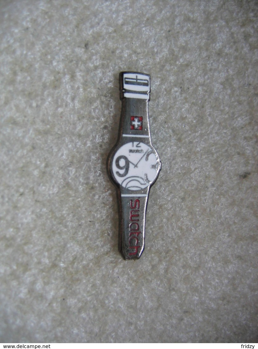 Pin's D'une Montre De La Marque Suisse SWATCH - Other & Unclassified