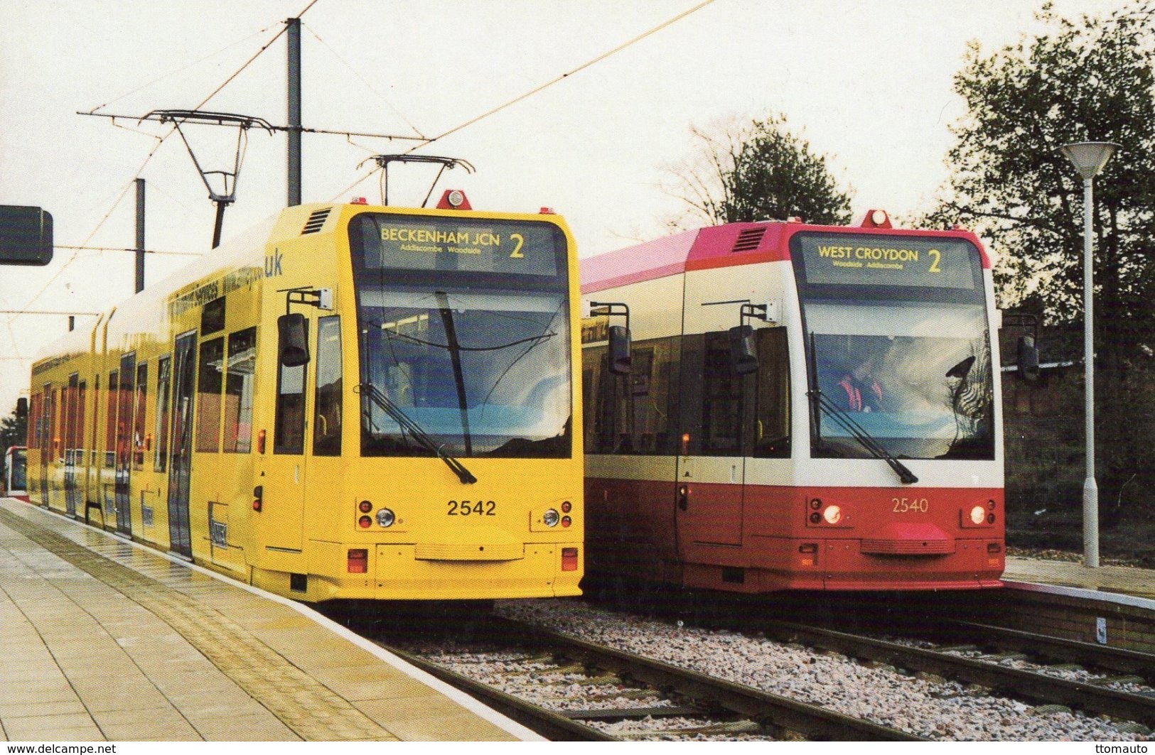 Amey Liveried Tram 2542 Passes Standard Liveried Tram 2540 At Sandilands  -  CPM - Strassenbahnen