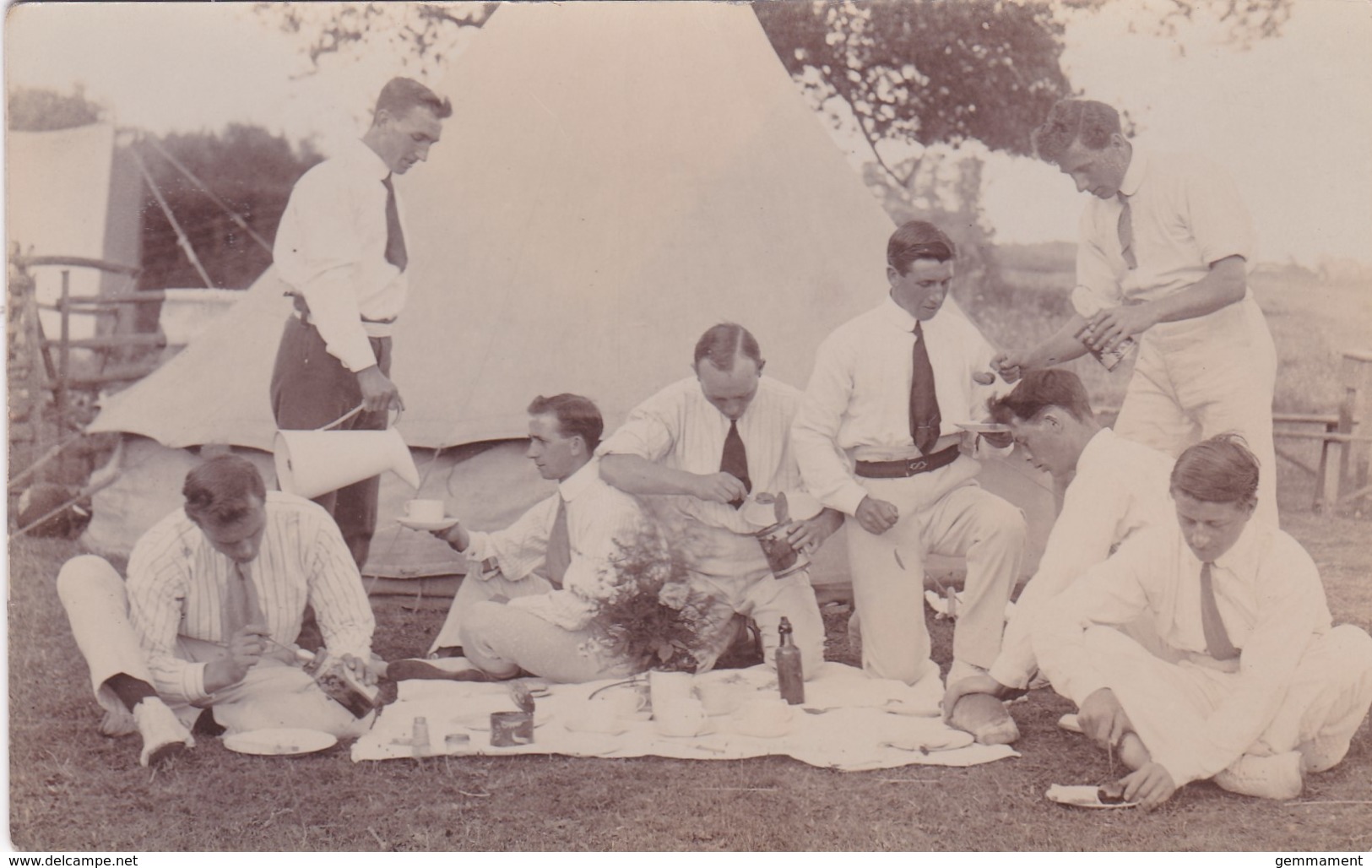 GROUP OF MEN OUTSIDE TENT - Other & Unclassified