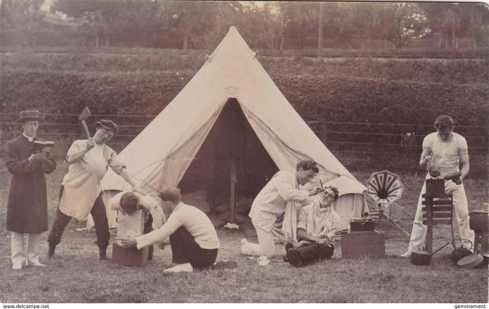 GROUP OF MEN OUTSIDE TENT - Other & Unclassified