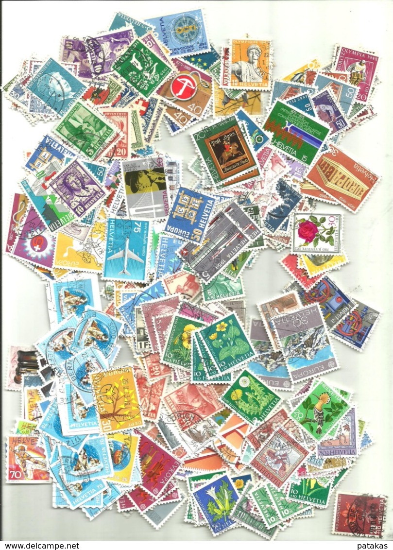 des milliers de timbres de Suisse