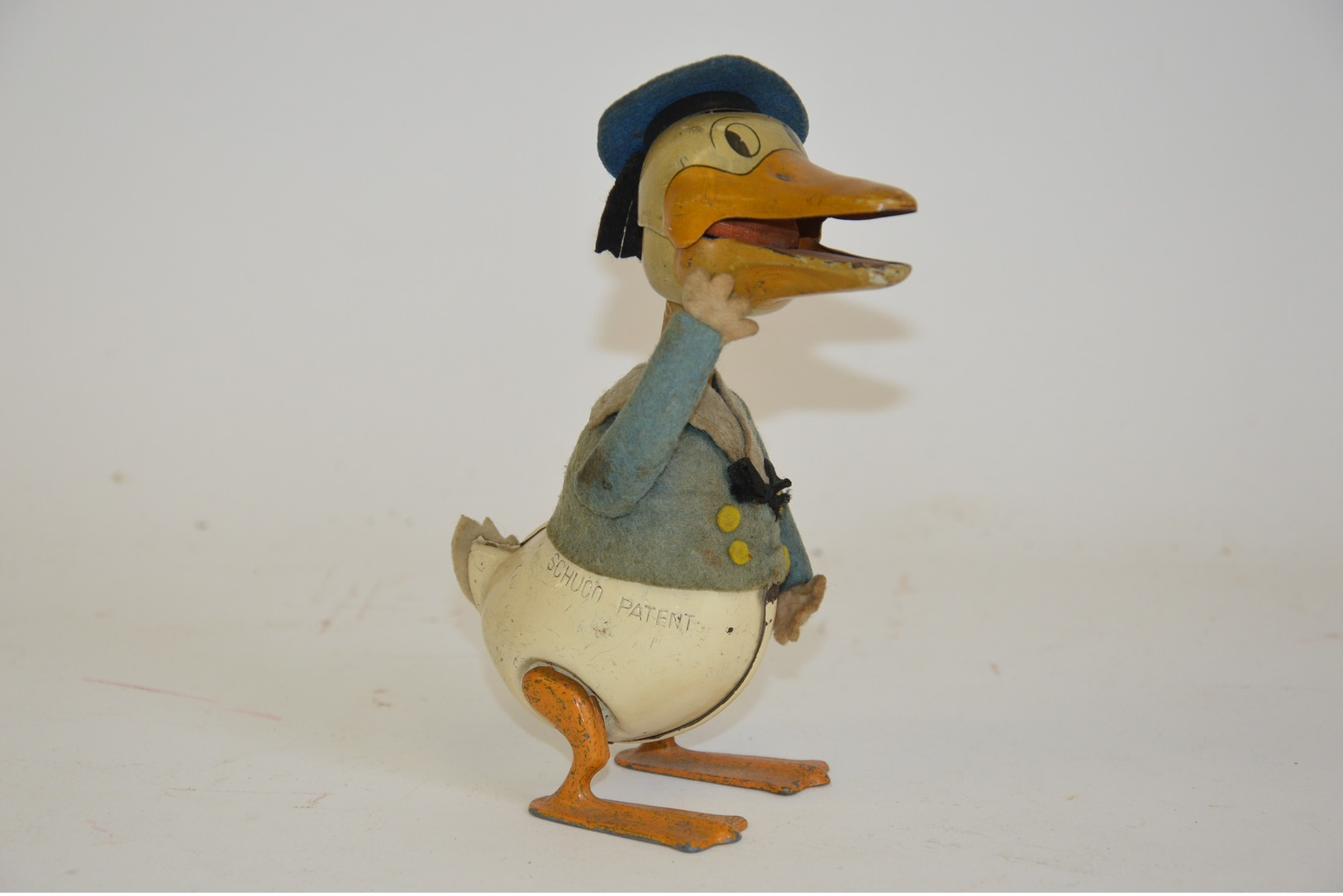 SCHUCO: Donald Duck Mécanique, Germany, 1920. Tôle Peinte Et Tissus. Hauteur: 14 Cm. Etat De Fonctionnement. - Other & Unclassified