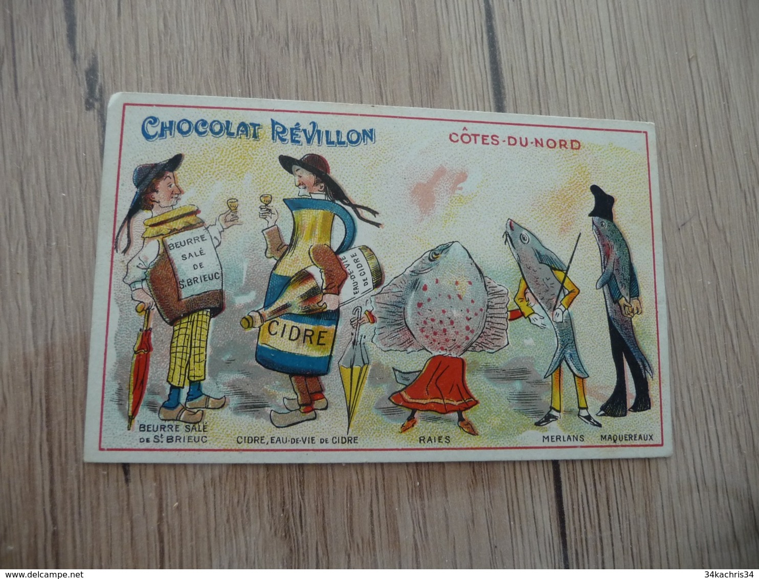 Chromo  Pub Publicitaire Chocolat Révillon Surréalisme Départements Côtes Du Nord - Revillon