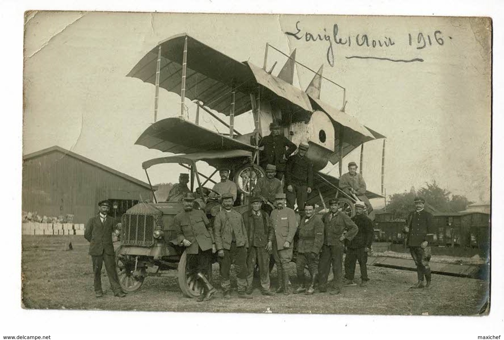 Carte Photo - L'Aigle (61) Aout 1916 - Camion R.E.O Transportant Un Avion Biplan Démonté à Proximité D'une Gare (animé) - War 1914-18