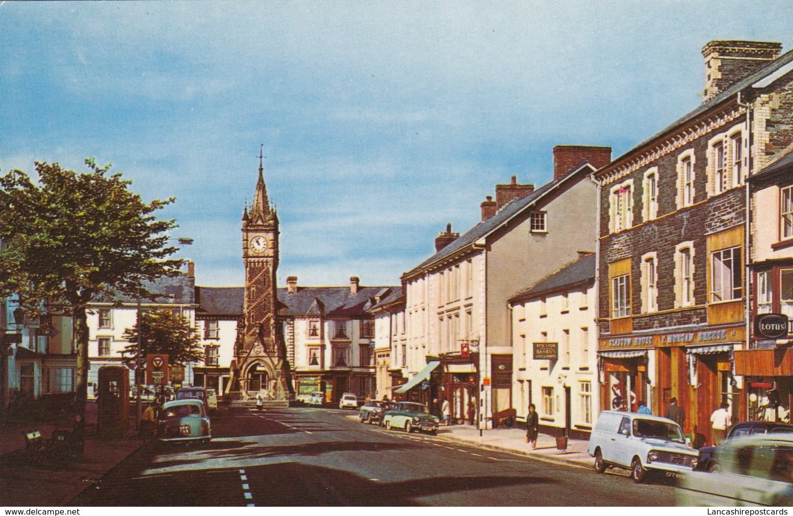 Postcard The Clock Tower Machynlleth Shops Old Cars & People  My Ref  B13756 - Montgomeryshire