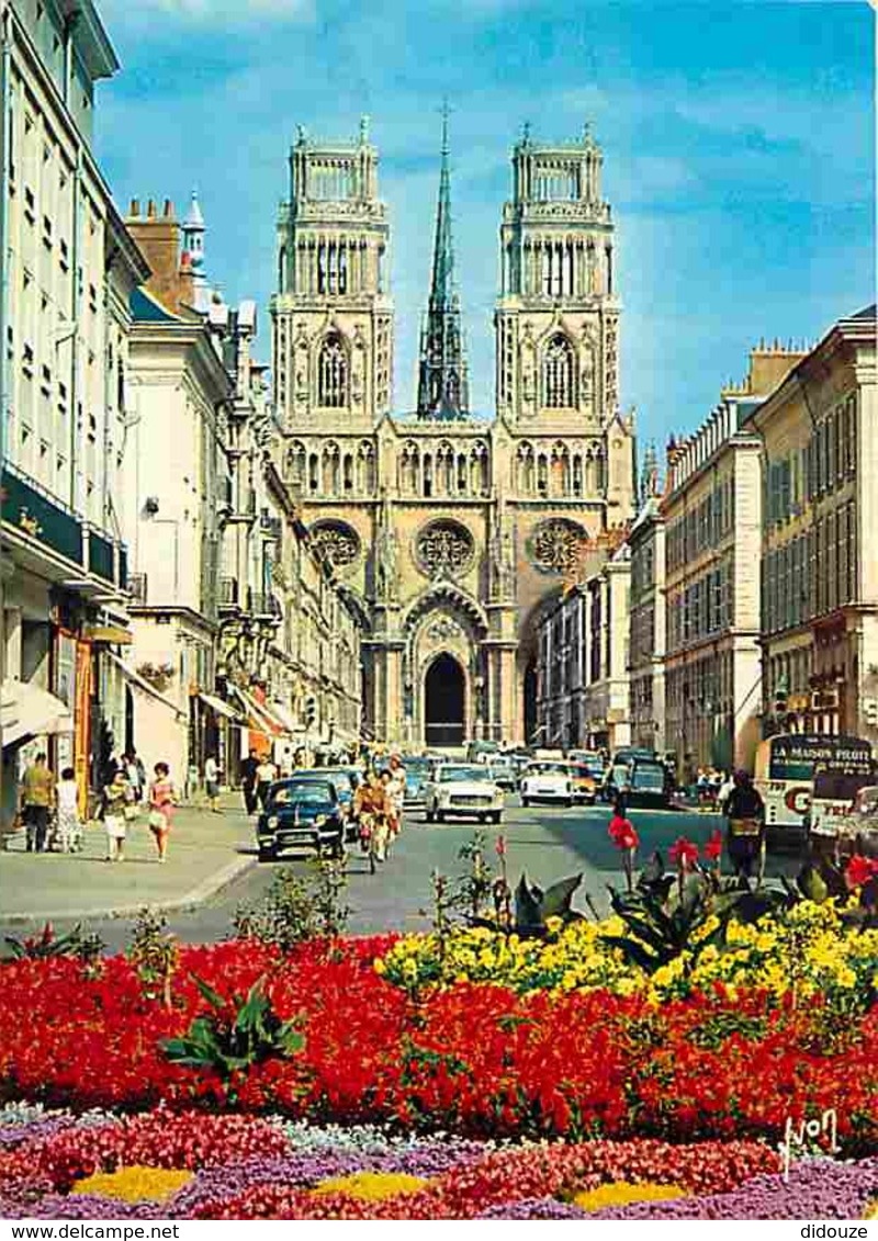 45 - Orléans - La Rue Jeanne D'Arc - La Cathédrale Sainte Croix - Automobiles - Fleurs - Voir Scans Recto-Verso - Orleans