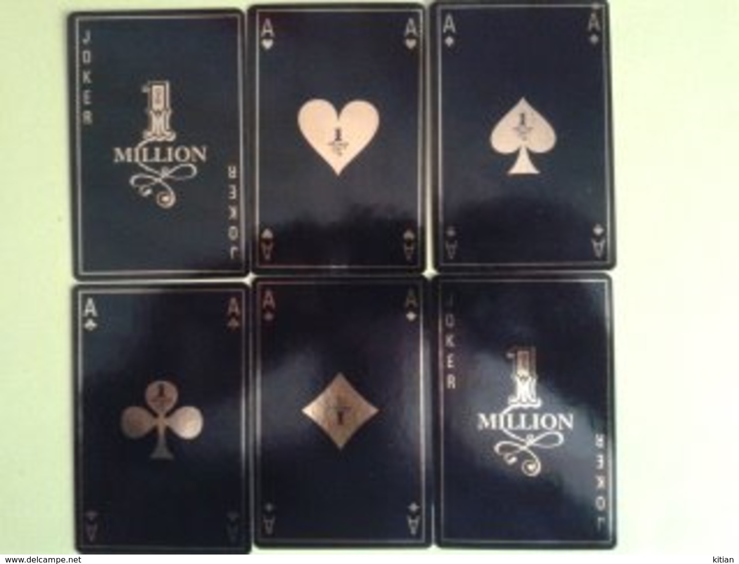 1 MILLION. Paco Rabanne. jeu de 52 cartes + 2 jokers. dans sa boite carton dorée