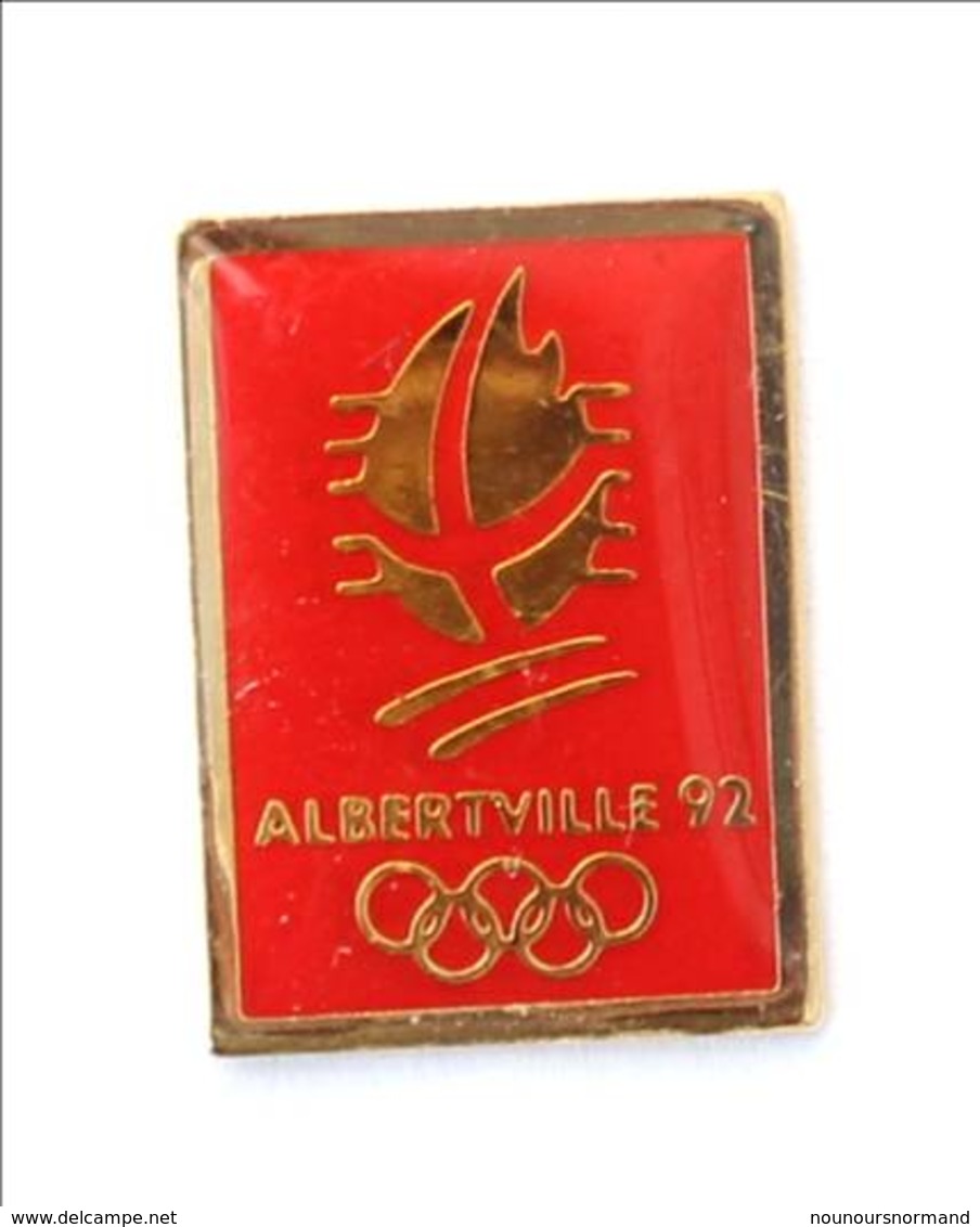 Pin's Logo J.O ALBERTVILLE 92 - Flamme Olympique Dorée Sur Fond Rouge - Cojo 1991 - I700 - Olympische Spelen