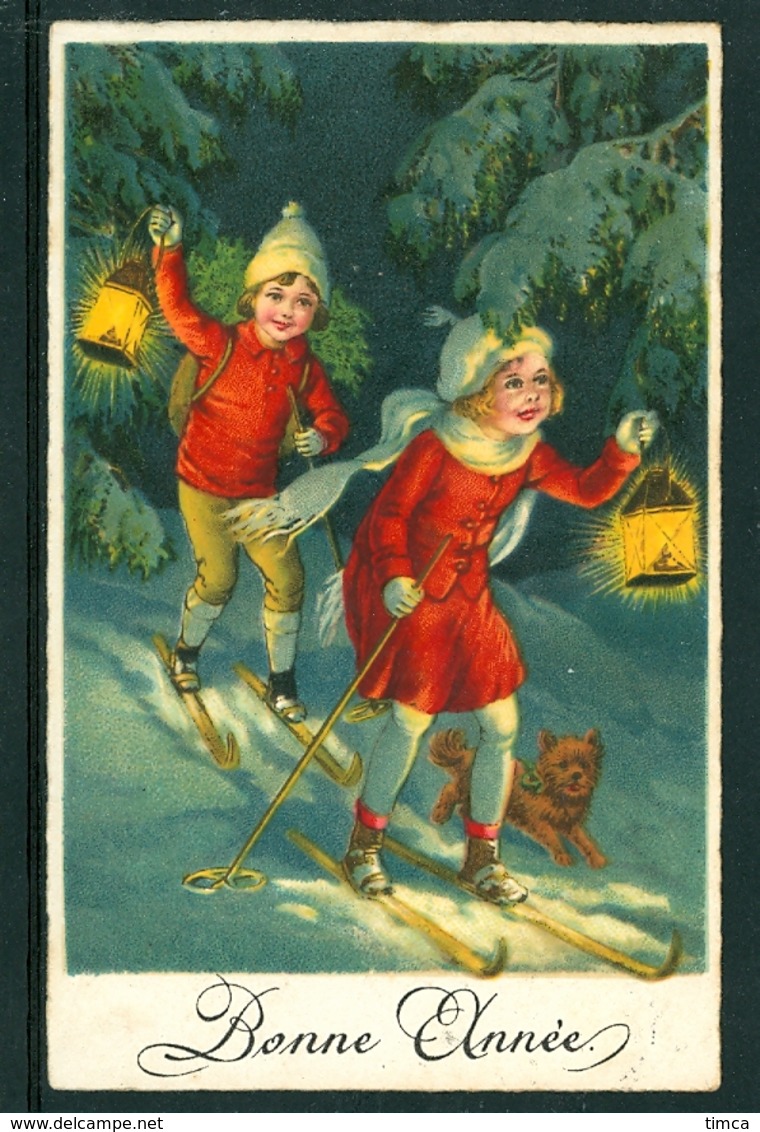 20437 Couple D’enfants Skiant à La Lumière De Lanternes Avec Petit Chien Dans La Neige - Anno Nuovo