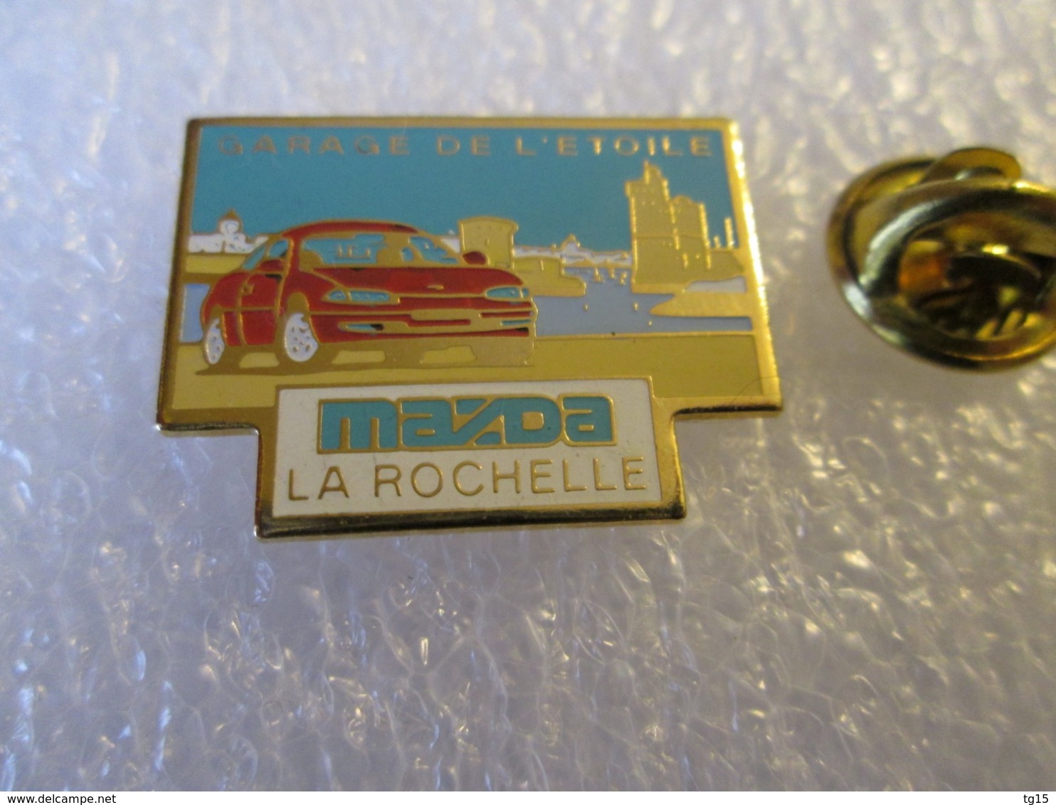 PIN'S   MAZDA  LA ROCHELLE  GARAGE DE L ETOILE - Otros & Sin Clasificación