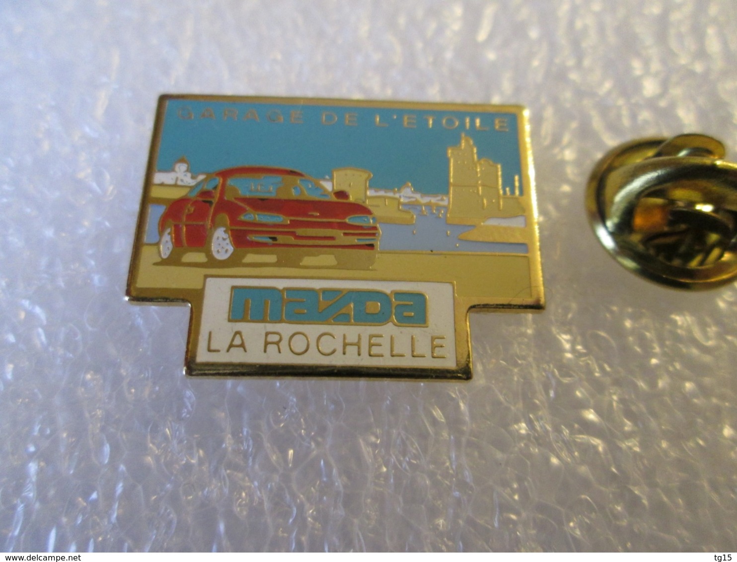 PIN'S   MAZDA  LA ROCHELLE  GARAGE DE L ETOILE - Other & Unclassified