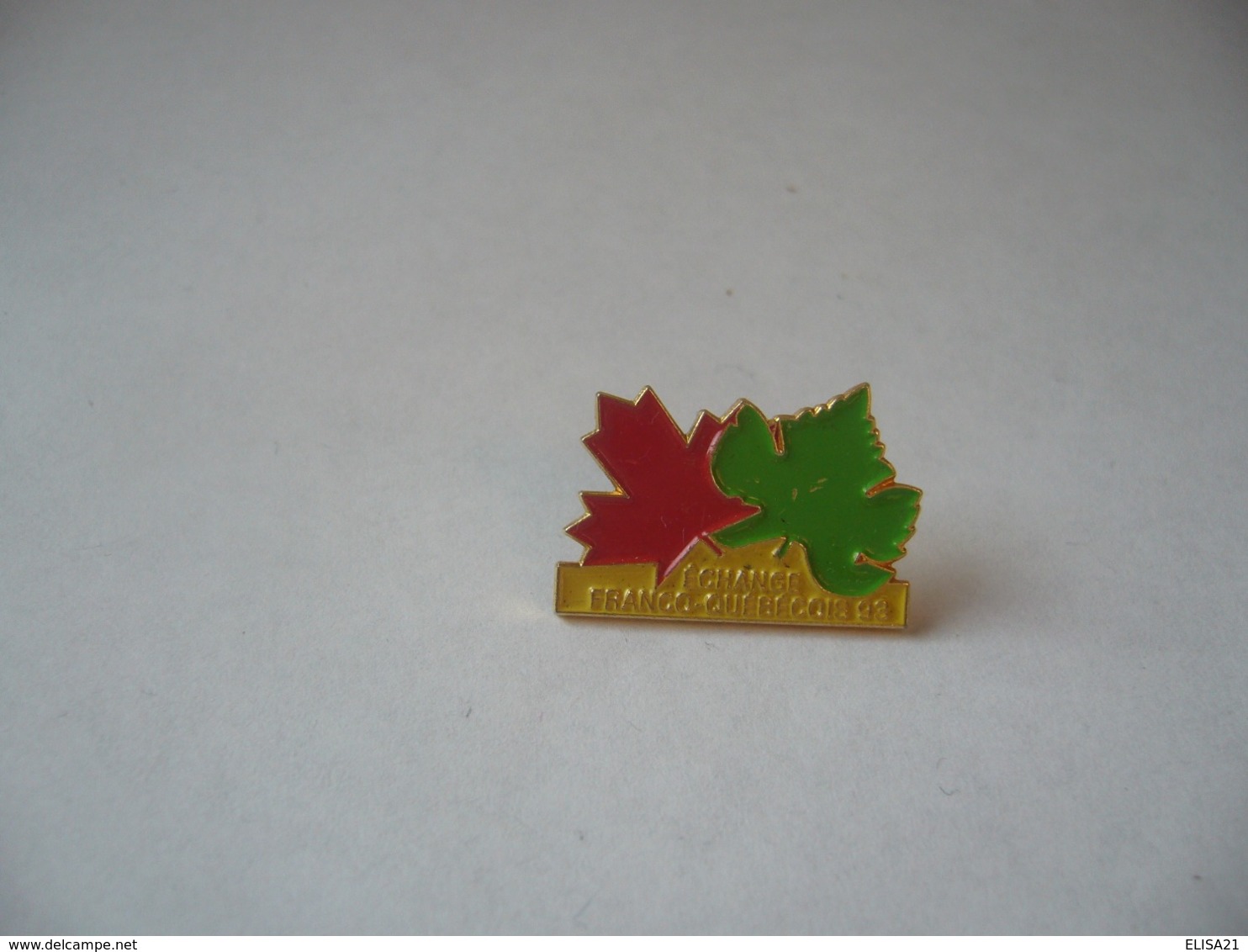 PINS PIN'S L'ECHANGE FRANCO QUEBEQUOIS 93  THÈME ASSOCIATIONS - Verenigingen