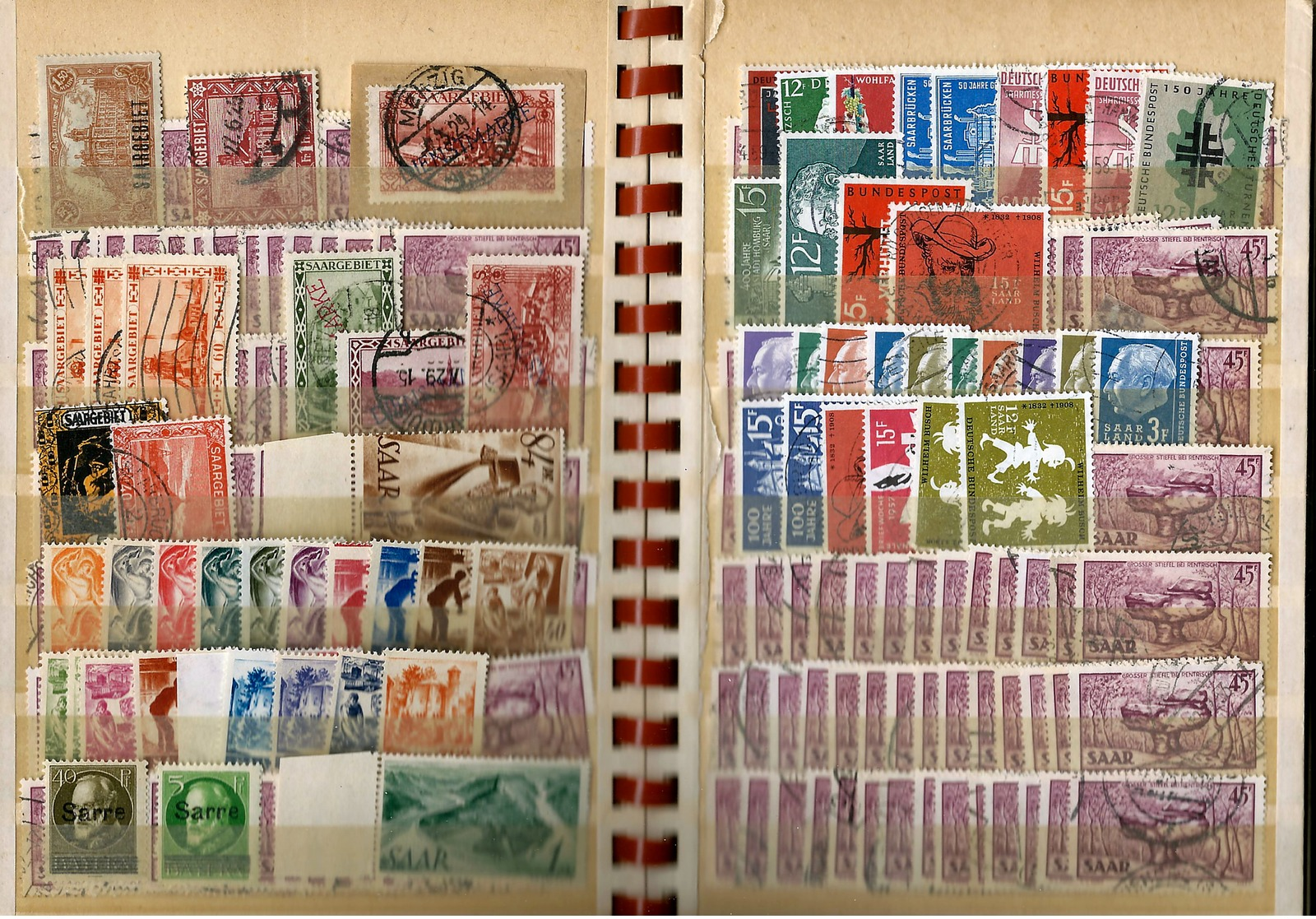 Sarre ,  huge party of postmarked and unused stamps   in a full stock-book (as per scan) VFU and MNH (handfull LH)