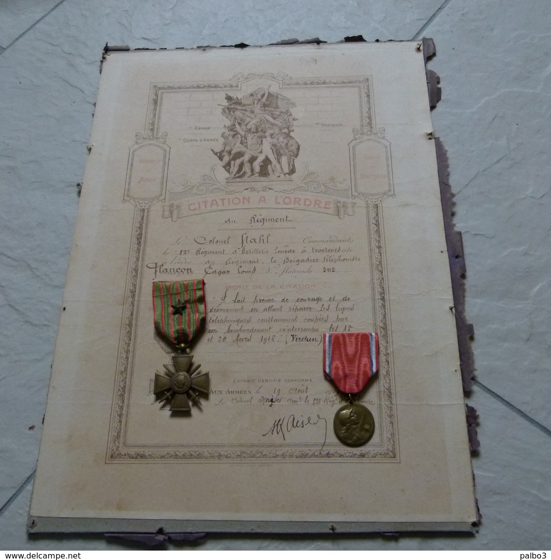 Citation a l'ordre du regiment 82 regiment artillerie lourde a tracteurs avec croix de guerre et medaille de verdun