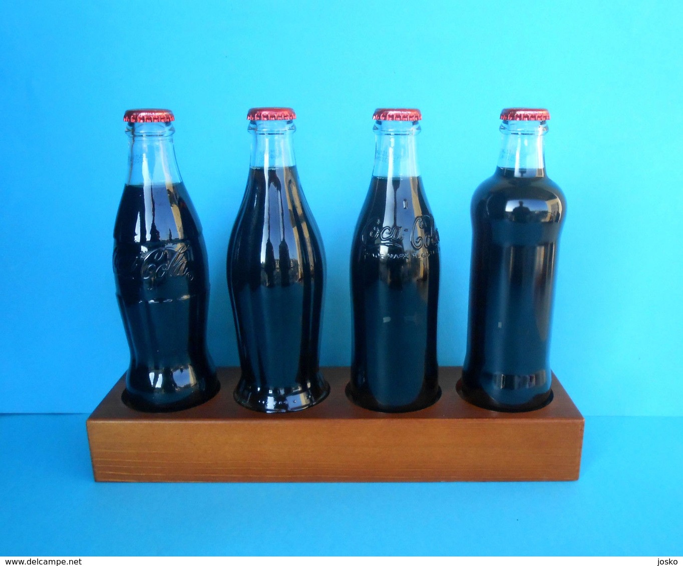 CROATIAN ISSUE ... COCA-COLA 125. YEARS - Full Set Of 4. Glass Bottles * FULL UNOPENED BOTTLES ON A SPECIAL RACK - Bouteilles