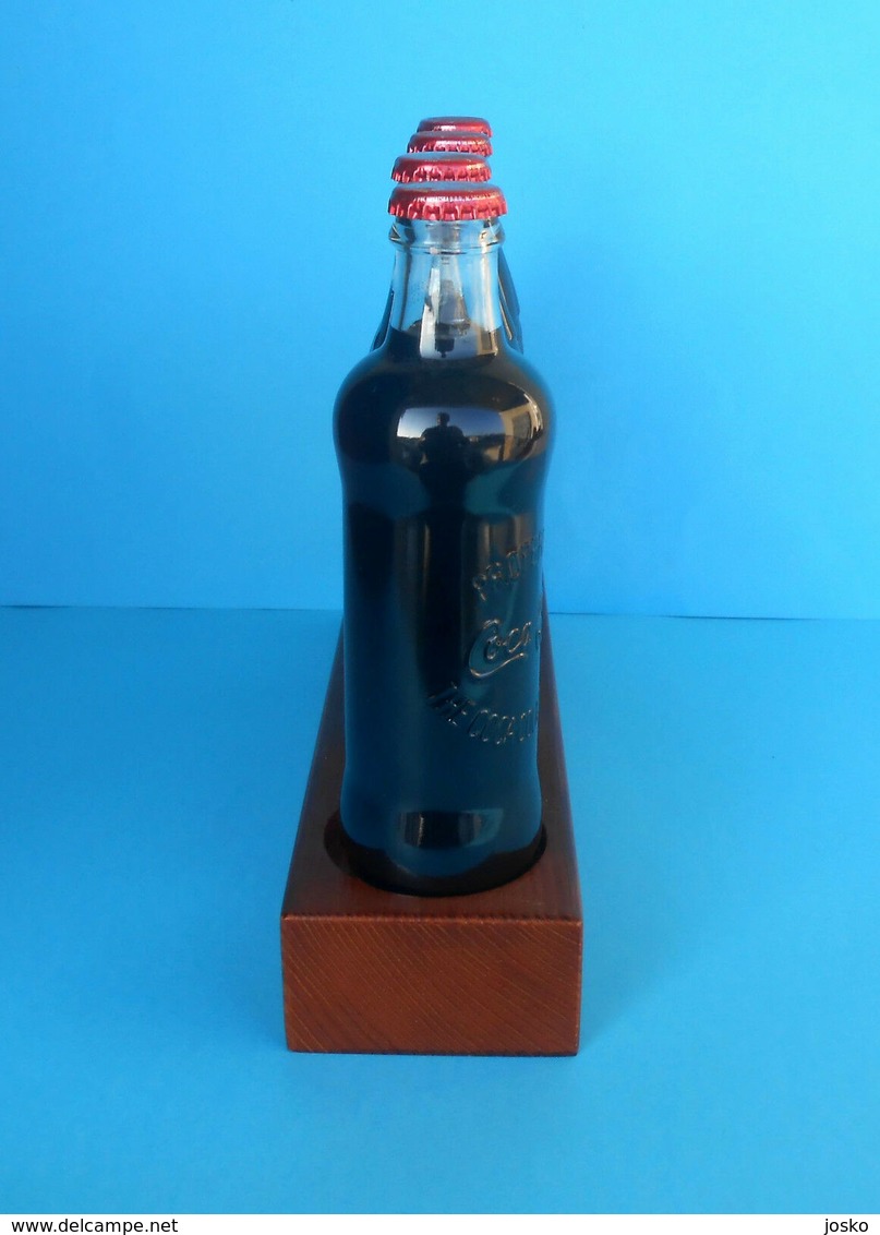 CROATIAN ISSUE ... COCA-COLA 125. YEARS - Full Set Of 4. Glass Bottles * FULL UNOPENED BOTTLES ON A SPECIAL RACK - Botellas