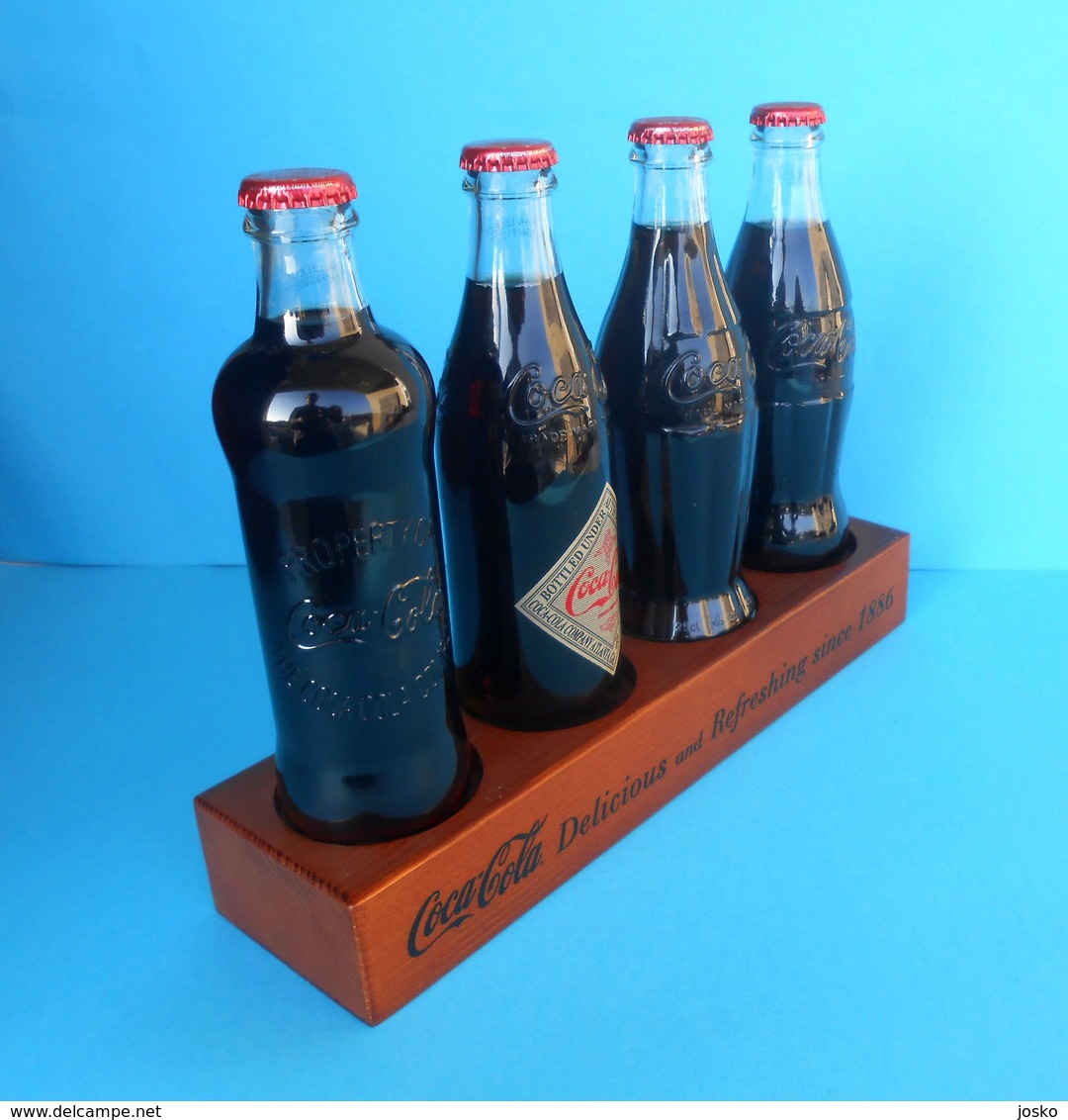 CROATIAN ISSUE ... COCA-COLA 125. YEARS - Full Set Of 4. Glass Bottles * FULL UNOPENED BOTTLES ON A SPECIAL RACK - Bouteilles