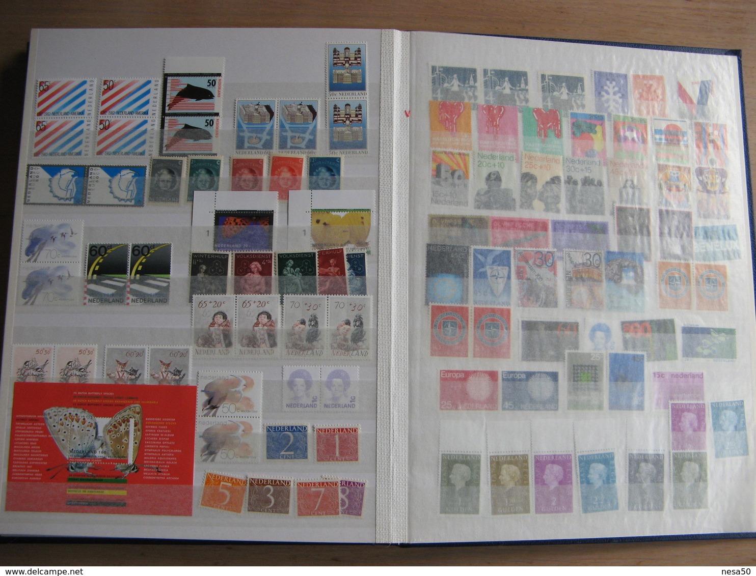 Nederland postfris guldens in blauw album 16 blz vol zie scan's