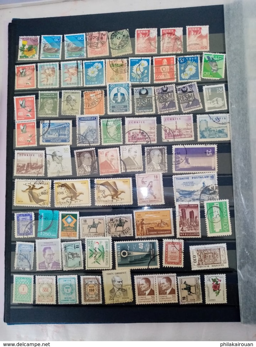 Lot numero 4 lot de 1000 timbres divers pays dont pays bas japon DDR allemagne et autres